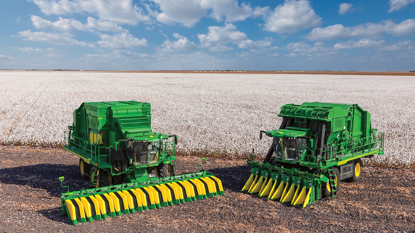 John Deere CP770 and CS770 in front of a cotton field